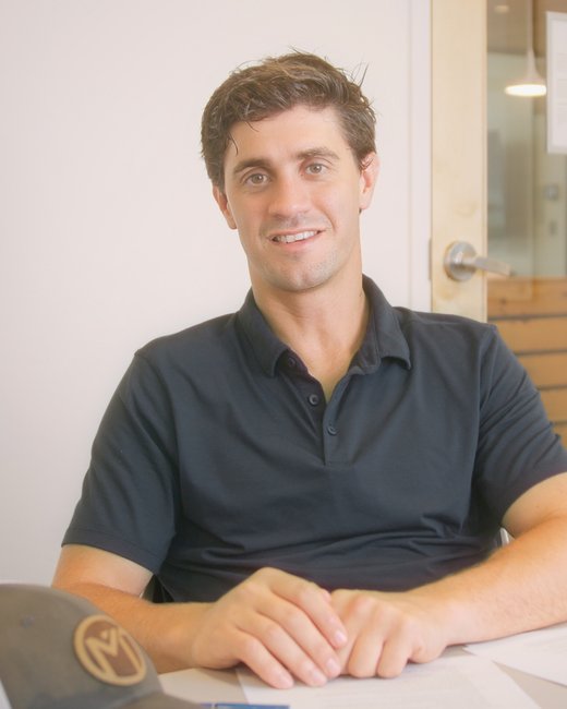 Alex McGowin at his desk in the McGowin Tax office